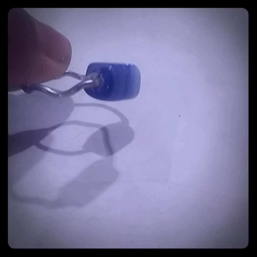 Simple blue quartz crimped ring